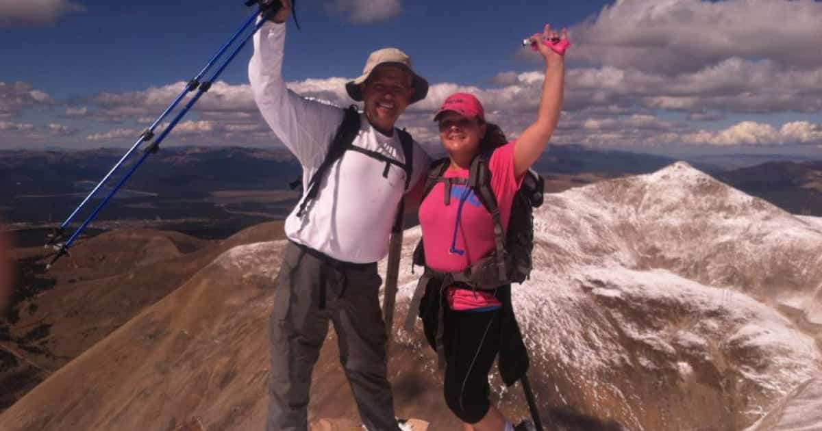 Bernadette Wisser Marketing Director at Columbine Label Company conquering mountain peaks with her husband.