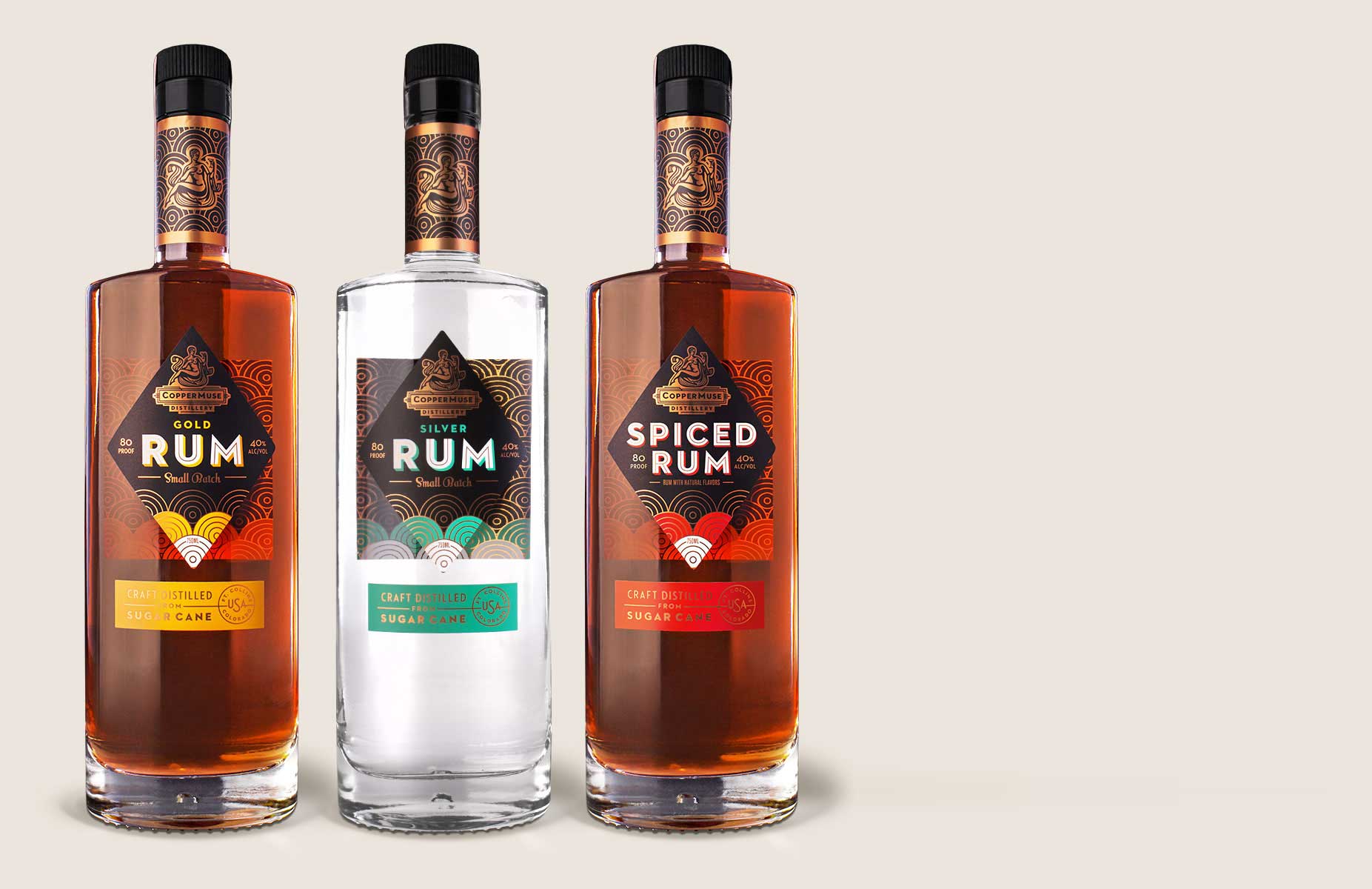 Gold, silver, and spiced rum with attractive bottle labels made by Columbine Label.