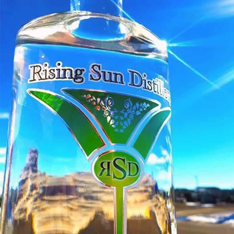 With a foil stamping printing process, Columbine Label Company created the new label for Rising Sun Distillery.