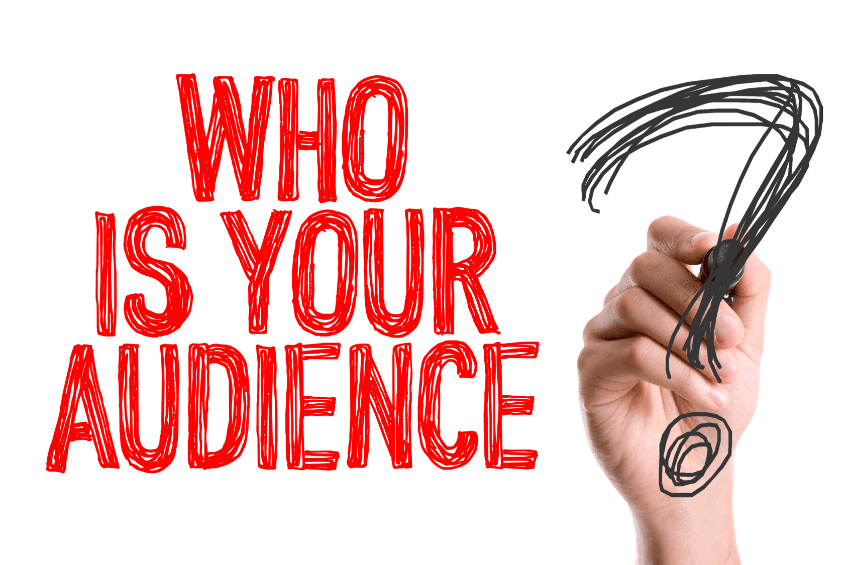 A hand writing with marker "Who Is Your Audience?" on a transparent surface.
