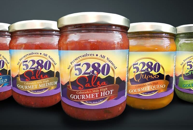 Five 16 oz. vibrant custom labeled jars of 5280 Salsa.