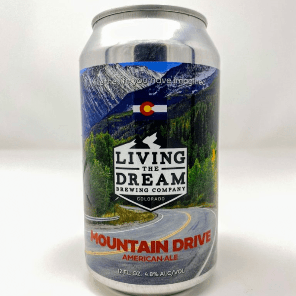 On the Living The Dream beer label, there is a picture of a mountain drive through the Colorado mountains.