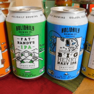 Four 12 FL. OZ. craft beer cans featuring the creative labels from Holidaily.