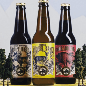 Small trees surround craft beer bottles with animal-themed labels.