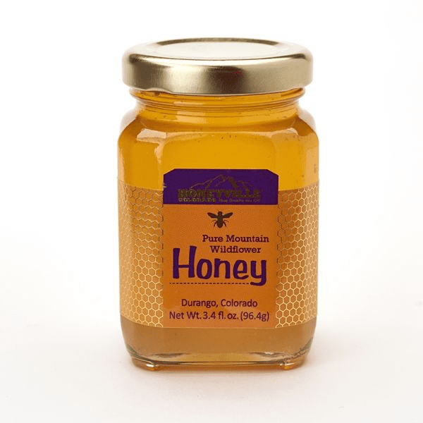 Pure Mountain Wildflower Honey hot stamp custom label printed by Columbine Label Company.