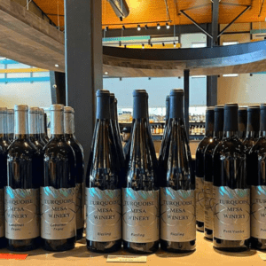 A variety of Turquoise Mesa Wines standing on a store shelf waiting for a new owner.