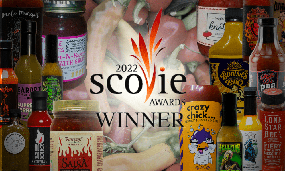 Multiple custom labeled spicy salsas and hot sauces competing for the 2022 Scovie Award.